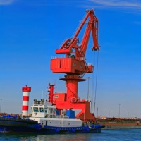 Grue portique robuste de 30 tonnes |   Hauteur de levage maximale 50 m Portée 13 m Capacité de charge élevée Manutention de conteneurs portuaires Marque Wanlong
