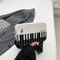 Nouveau Sac à Bandoulière Simple et Unique Piano Girl 2026 Grande Capacité Style Coréen Tendance Contraste de Couleurs Petit Sac à Fermeture Éclair