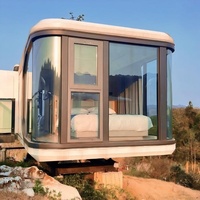 Maisons préfabriquées de luxe modernes en forme de capsule spatiale, style de conception chinoise, mini-villa mobile, conteneur préfabriqué, maison mobile