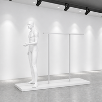 Présentoir de vêtements autoportant blanc à deux poteaux avec base de mannequin pour aménagement de boutique