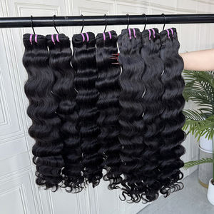 ผมมนุษย์แท้แบบเวฟจากกัมพูชา ขายส่งแบบเป็นมัด สีธรรมชาติ เกรด 10A เย็บสองชั้นด้วยเครื่องจักร บรรจุภัณฑ์ปรับแต่งได้ รับสั่งซื้อจำนวนมาก - Product Image 1