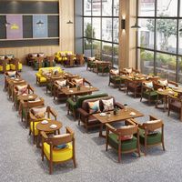 Ensemble de meubles de restaurant modernes en bois Cafe Leisure, chaise de salle à manger rembourrée en cuir PU massif, table de salle à manger ronde