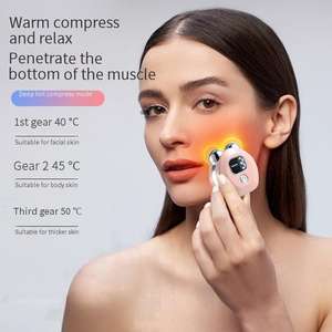 Masseur facial portable avec écran numérique - 3 niveaux de chaleur et longue durée de vie de la batterie - Product Image 4