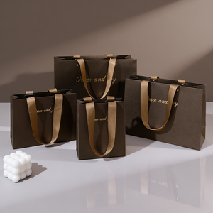 Bolsa <span class=keywords><strong>de</strong></span> <span class=keywords><strong>Papel</strong></span> Kraft Marrón Mate con <span class=keywords><strong>Bolsas</strong></span> <span class=keywords><strong>de</strong></span> Regalo <span class=keywords><strong>de</strong></span> Lujo Ecológicas <span class=keywords><strong>Hechas</strong></span> <span class=keywords><strong>a</strong></span> <span class=keywords><strong>Mano</strong></span>, Logotipo Personalizado, Cinta y Asa <span class=keywords><strong>de</strong></span> Lazo para Gafas - Product Image 1