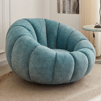 Fauteuil lounge individuel en velours, style scandinave moderne et luxueux, incontournable pour le salon - Collection 2026