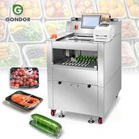 Machine d'emballage sous film étirable pour poulet entier, légumes, aliments, viande, avec plateau rétractable en plastique