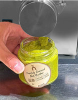 Machine à fabriquer du beurre de noix, de sésame, d'arachides, de pistaches et de cacahuètes