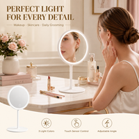 Miroir de maquillage LED autoportant blanc avec bras de support fin, cadre circulaire et construction de table à une seule face