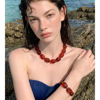 JINYOU 6455 Ensemble de bijoux en acier inoxydable avec collier et bracelet à maillons en perles de résine épaisses irrégulières à texture ambre bohème