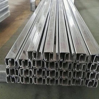 Suministro directo de fábrica Estructura de acero resistente Puerta corredera industrial 750 Rueda de riel colgante para construcción Cortado a pedido