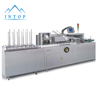 Machine d'emballage automatique de cartons pour capsules de café