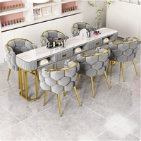 Ensemble de table et chaise de salon de manucure QM luxueux pour deux personnes, avec armoire de rangement, dessus en velours moderne, meubles écologiques pour hôtels et commerces