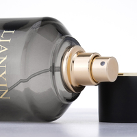 Flacons de parfum en verre vides personnalisés noirs de 30 ml, 50 ml, 100 ml avec impression sérigraphique et pulvérisateur à pompe pour la vente en gros