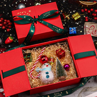 Boîte d'emballage en carton recyclable avec logo estampé à chaud, design moderne, double porte, nœud papillon rouge, revêtement UV pour Noël