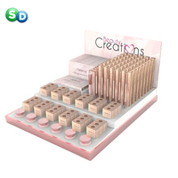 Présentoir de comptoir en carton pour magasin de rouge à lèvres de supermarché personnalisé SD pour les cosmétiques de maquillage de Guangdong