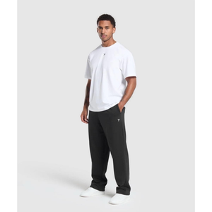Pantalones de gimnasio unisex 100% algodón para hombre y mujer, pantalones de pierna ancha de cintura media, estilo callejero deportivo, servicio OEM al mejor precio disponible - Product Image 6