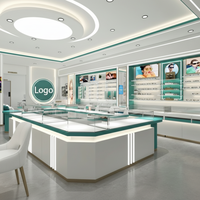 Vitrine de présentation haut de gamme pour bijoux et lunettes, design îlot, dimensions personnalisables, blanc/vert sarcelle, avec compartiment de rangement pour mobile