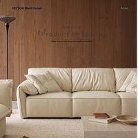 Canapé fonctionnel en cuir véritable Saffiano noir, style Bauhaus français, trois places, oreilles d'éléphant, nouveau modèle 2026, pour salon de villa, électrique