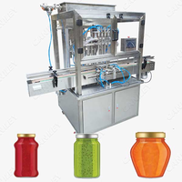Machine de remplissage de pots de miel à 4 têtes, machine de remplissage et de bouchage automatique de haute précision pour huile médicale en verre numérique