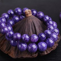 Fabricants en gros de bracelets en pierres de charoïte naturelle russe, bijoux en cristal en gros pour hommes et femmes
