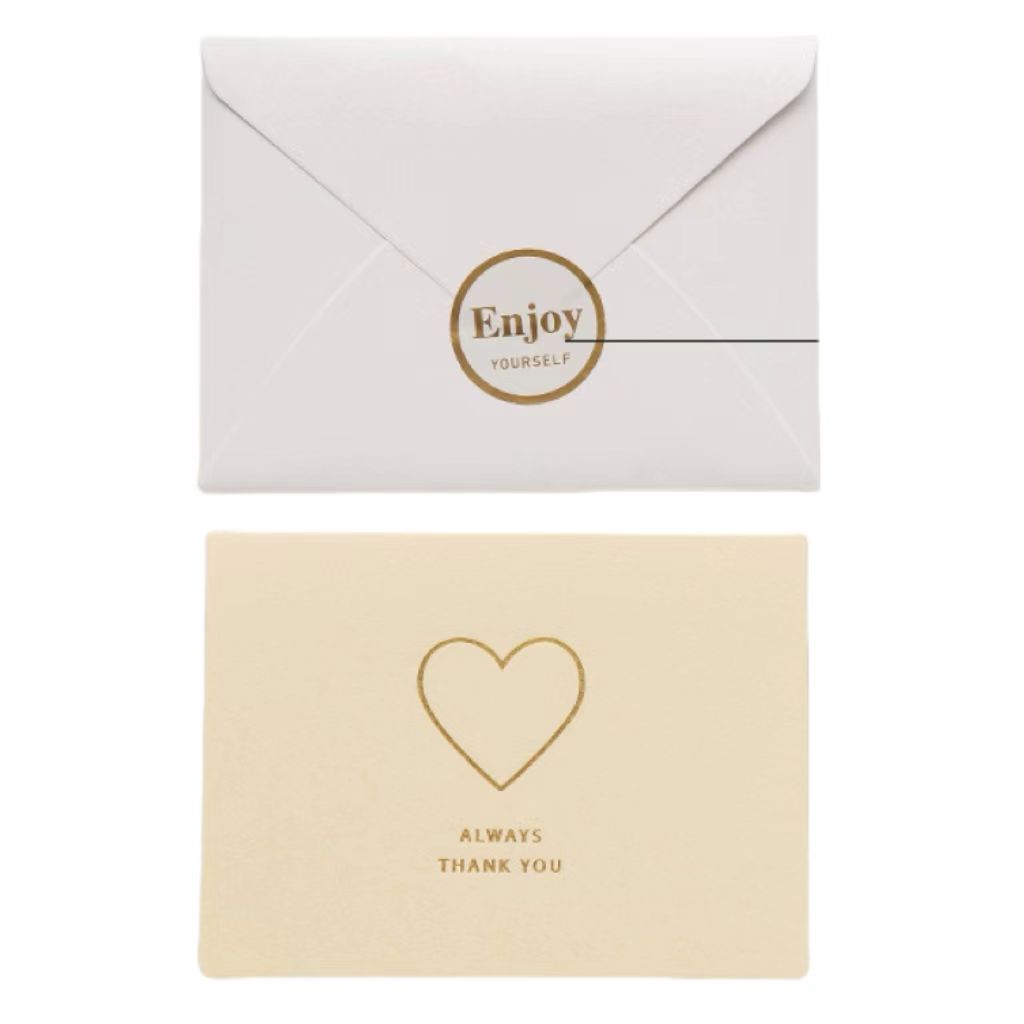 1 carte de vœux + 1 enveloppe + 1 autocollant / ensemble