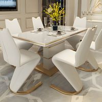 Chaises de salle à manger en cuir et ensemble de table à manger, style français moderne de luxe, table extensible, pieds en acier inoxydable, utilisation hôtelière, vente en gros