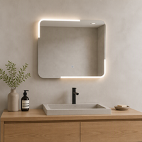 Miroir mural LED géométrique asymétrique moderne, forme irrégulière à encoches, sans cadre, sculptural, pour salle de bain de luxe