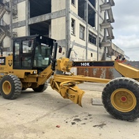 Prix avantageux, presque neuf, inspection complète disponible, vidéo disponible, accessoires complets, niveleuse Caterpillar 140K pour la construction routière