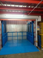 500-2000kg marchandises électriques industrielles soulevant l'ascenseur de fret vertical entrepôt hydraulique Double rail de guidage ascenseur de cargaison