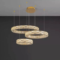Lustre en cristal de luxe doré à hauteur réglable, luminaire suspendu circulaire LED pour villa, hall d'hôtel, salon
