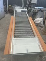 Unité de fonctionnement automatique de grille à dents rotatives pour système de traitement des eaux usées industrielles
