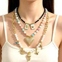 FM-LHN2244 Magnifique Collier Plaqué Or avec Pendentif Croix/Cœur, Breloque Coquillage Religieuse, Vente en Gros, Collier Tendance pour Femme avec Perles Blanches