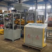 Machine à fabriquer des blocs hydrauliques QT4-15 pour blocs creux et pleins en béton et pavés