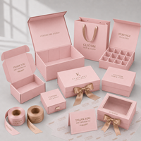 Boîte d'emballage en papier ondulé rose personnalisée en usine pour les ensembles cadeaux de cosmétiques et de soins de la peau