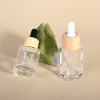 Botol Kaca Pipih 20ml 30ml Custom dengan Cincin Bambu dan Pipet Tetes untuk Kemasan Kosmetik, Minyak Rambut, dan Esens - Promo Hot Sale