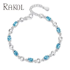 RAKOL ZPB4941 elegante plateado con incrustaciones de corte ovalado pulsera de circón cúbico cobre rojo azul cristal joyería para mujer chica