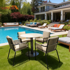 Ensemble de table et chaises de restaurant en rotin pour l'extérieur, design traditionnel écologique, idéal pour hôtels, cours et parcs - Product Image 1