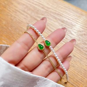 กำไลหยกสีเขียวมรกตทรงน้ำเต้า/ไข่ ยี่ห้อซินฟลาย สำหรับเป็นของขวัญในงานปาร์ตี้และงานแต่งงาน - Product Image 4