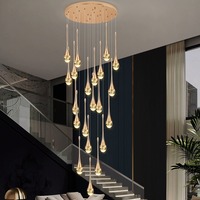 Lustre en cristal à hauteur réglable avec finition dorée LED à intensité variable pour salon
