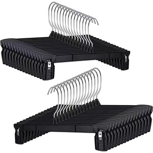 Perchas de Plástico Negras para Pantalones, Perchas Extensibles para Faldas, Perchas Delgadas para Ropa con Clips para Armario - Product Image 1