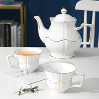 Service à thé à café en porcelaine de couleur blanche de Style européen de luxe 8 pièces avec théière en céramique plaquée or et ensemble de tasses