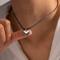 Collier de luxe pour femmes en acier inoxydable avec pendentif cœur épais en corde de cire noire plaqué or 18 carats