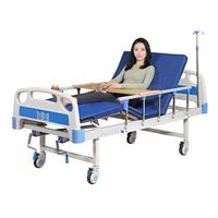 Lit médical à double manivelle robuste, deux fonctions, panneau Baosteel, roulettes de 5 pouces pour hôpital, maison de retraite