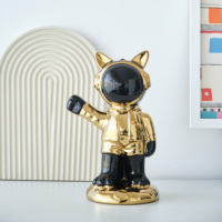 Nouvel arrivage de statue d'astronaute plaqué or noir décoration de bureau créative ornements en céramique