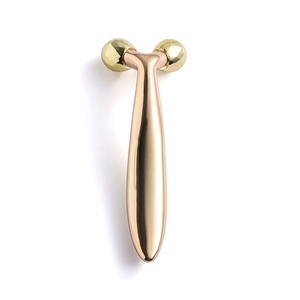 Outil de massage facial manuel en métal de haute qualité en forme de Y avec double rouleau à billes - Product Image 1