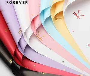 Papier d'emballage floral en PVC enduit réutilisable <span class=keywords><strong>FOREVER</strong></span> - Imprimé nœud papillon pour emballage de cadeaux DIY et bouquets de fleuristes (57*57cm) - Product Image 1