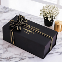 Boîte cadeau rigide noire personnalisée avec surpiqûres dorées, ruban en satin et logo estampé à chaud pour emballage de parfum, montre ou cadeau