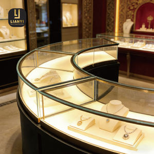 Vitrina de Joyería de Vidrio Curvo con Diseño de Arco Sin Costuras que Crea un Centro de Atención Fluido y Moderno para Boutiques de Lujo - Product Image 1