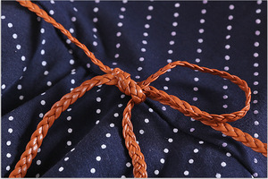 Vêtements pour enfants de style coréen en gros, robe sans manches à pois mignonne avec ceinture à nœud pour les petites filles, en provenance de Chine - Product Image 4