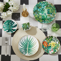 Service de table de luxe en or véritable motif feuille tropicale, assiette de présentation en céramique jungle en porcelaine fine, tasse à café et bol en porcelaine pour événements hôteliers